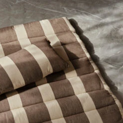 Ferm LIVING | Strand Outdoor Quilted Mattress - Carob Brown/Parchment 6 Ferm LIVING | Strand Outdoor Quilted Mattress - Carob Brown/Parchment -Earl of East Store 1104269089 10 1440x 23212348 3478 451b b194 cbef6c3907a7